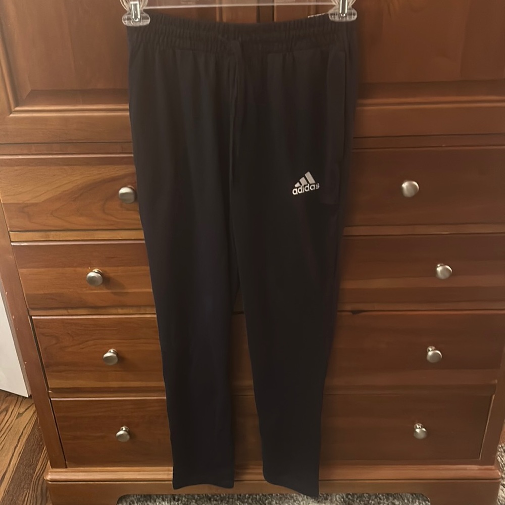 NWT Adidas black tapered leg athletic pants. Drawstring elastic waist.